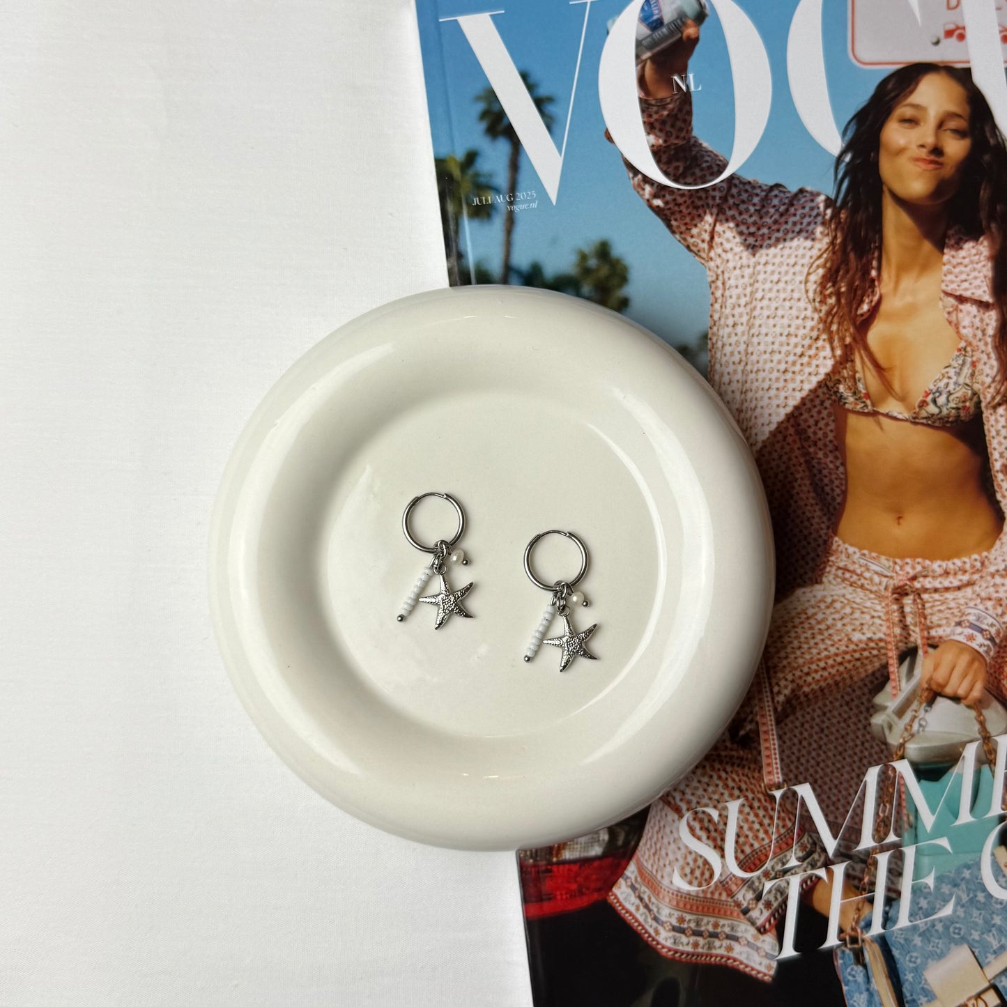 Oorbellen zeester - Zilver